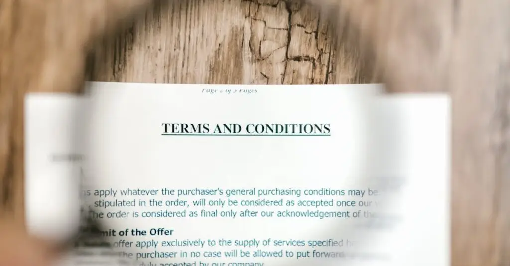 Selective Focus Photo of Terms and Conditions Written on a Paper