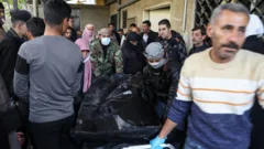 Bodies showing signs of torture found at Damascus hospital, Syria rebels say